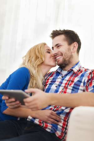 Portrait of lovely couple at home の写真素材