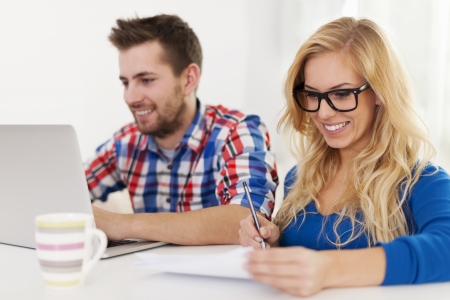 Couple paying bills at home
の写真素材