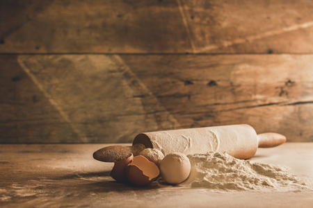 Close up of baking ingredients on wood の写真素材