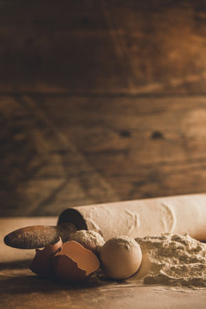 Home baking ingredients on wood 
の写真素材