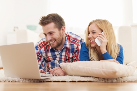 Young couple making online order の写真素材