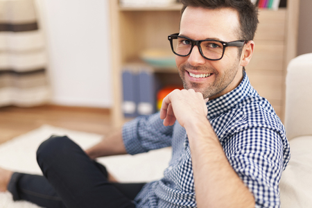 Portrait of smiling man at home の写真素材
