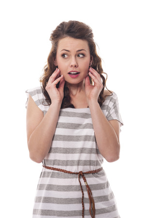 Portrait of scared young woman の写真素材