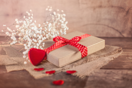 Valentine's gift and heart on wood の写真素材