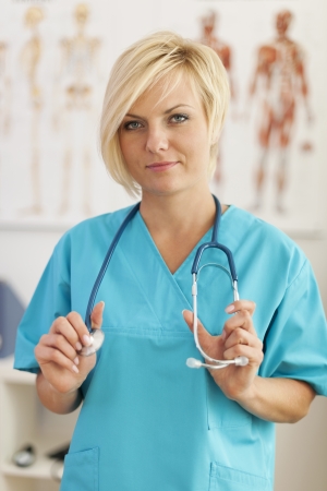 Portrait of young blonde female surgeonの写真素材