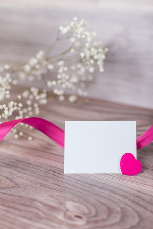 Close up of valentine card on woodの写真素材
