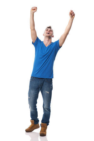 Young happy man celebrating success の写真素材