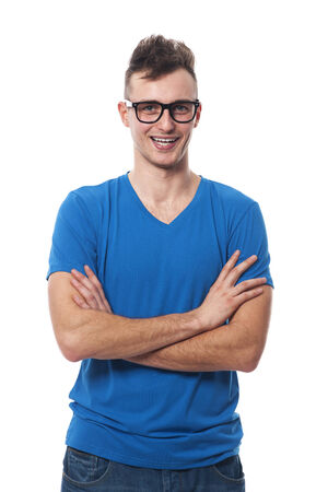 Laughing handsome man with arms crossedの写真素材