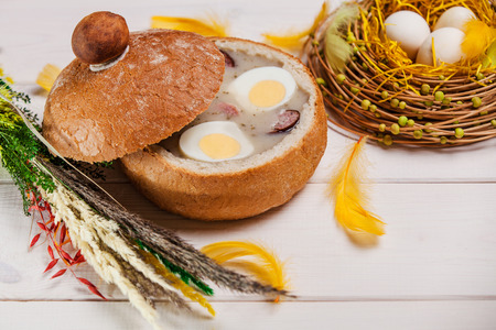 White borscht in bread on wood table の写真素材