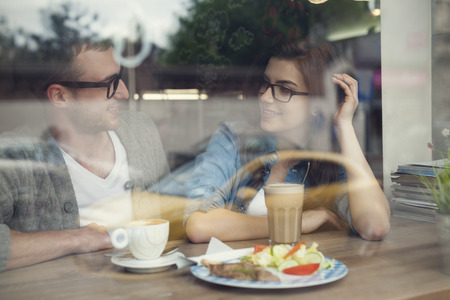 Happy man and woman in lunch time  の写真素材