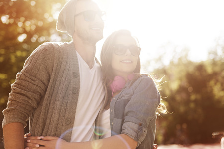 Portrait of hipster couple in sunny day の写真素材