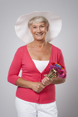 Portrait of beautiful senior woman during spring time の写真素材
