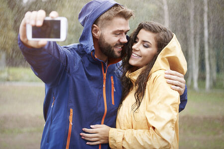 Sweet selfie in rainy dayの写真素材