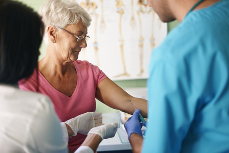Medical test from blood performed by medical personnel