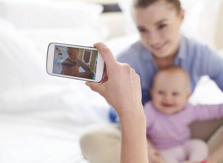 Family memories staying on our photosの写真素材