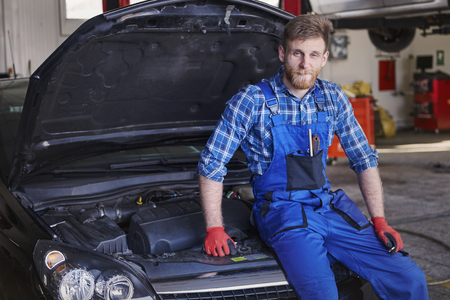 Portrait of cars mechanic in workshopの写真素材