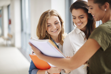 Preparing for hard exam with friendsの写真素材