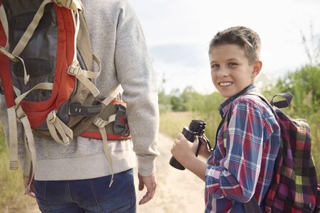 Little boy discovering world with his fatherの写真素材