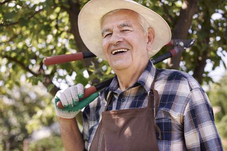 He like working in the gardenの写真素材