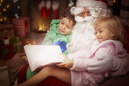 Mysterious tale read by the Santa Clausの写真素材