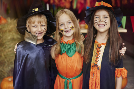 Cheerful children with Halloween face paint