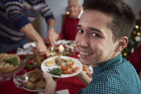 Dinner in christmas time with familyの写真素材
