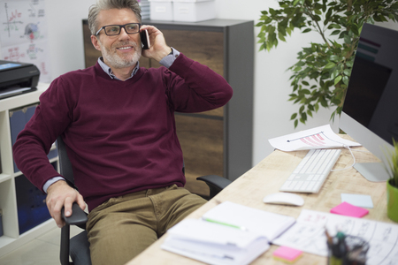 Owner of the company in his office interiorの写真素材