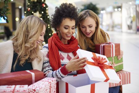 Curious women of what is inside the boxの写真素材