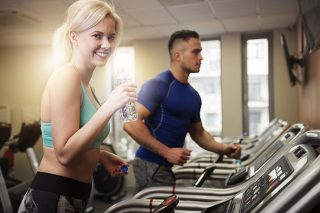 Sip of water during runningの写真素材