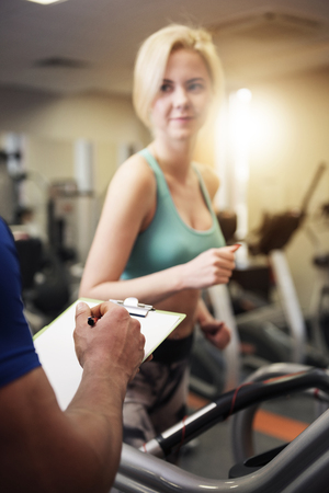 Results of workout are under instructor's controlの写真素材