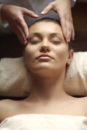 Head massage is very relaxingの写真素材