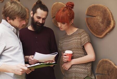 Group of young business people at work