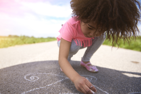 Little girl creating something amazingの写真素材