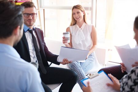 Funny talk while business meetingの写真素材