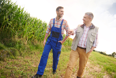 Two farmers on the fieldの写真素材