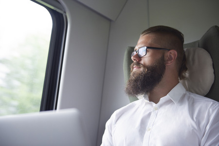 Thoughtful businessman in the way by train 