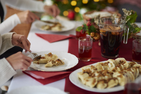 Eating dumplings with the familyの写真素材