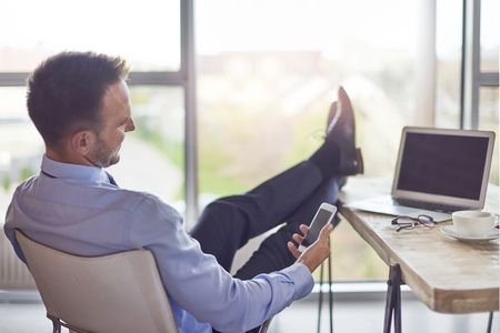 Having break in comfortable positionの写真素材