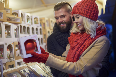 Cheerful couple at the Christmas marketの写真素材