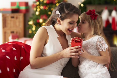 Little girl taking care about mummyの写真素材