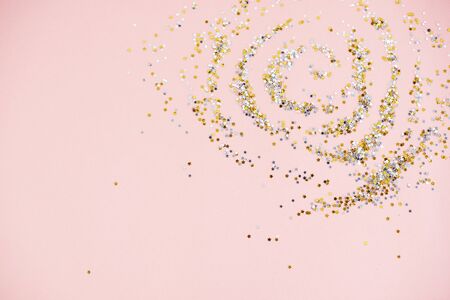 Circles made by gleaming confettiの写真素材