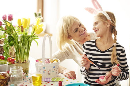 Kid and woman celebrating time together