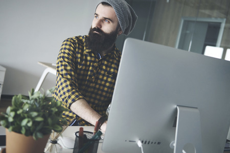 Male owner at his home office