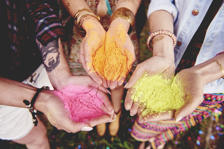 Holi colors in hand of womenの写真素材