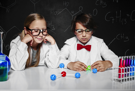 Two colleagues from school thinking about chemistryの写真素材