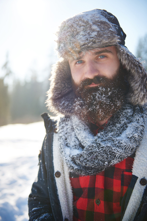 Man with some snow on his beardの写真素材
