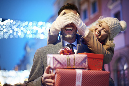 Woman covering her partners eyesの写真素材