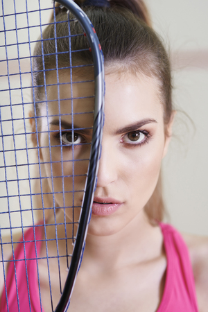 Portrait of squash player or tennis player の写真素材