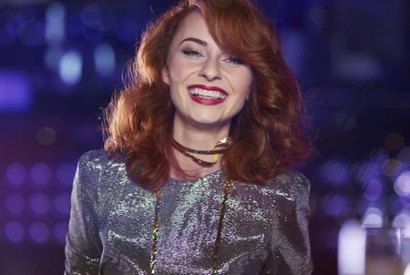 Shot of elegant red haired woman の写真素材