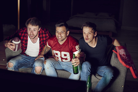 Footbll fans awaiting for scoreの写真素材